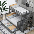 Litera de madera con escalera, estantes de almacenamiento y cama nido extraíble