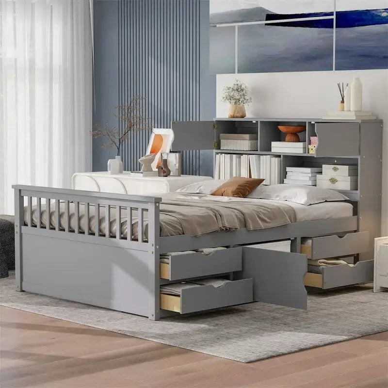 Cama de plataforma de madera con cuatro cajones y cabecero con almacenamiento tipo librería