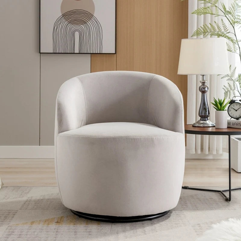 Sillón tipo barril giratorio de terciopelo con respaldo curvado y base negra