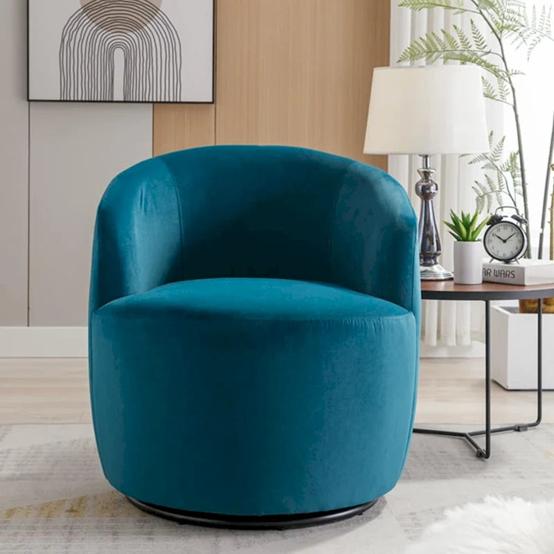 Sillón tipo barril giratorio de terciopelo con respaldo curvado y base negra