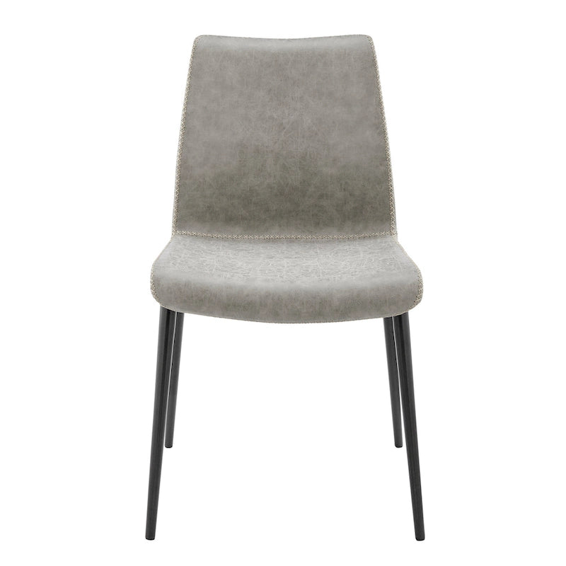 Silla de comedor moderna de cuero sintético con patas de acero negro y costuras