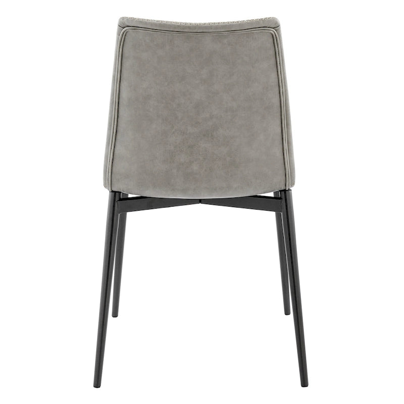 Silla de comedor moderna de cuero sintético con patas de acero negro y costuras