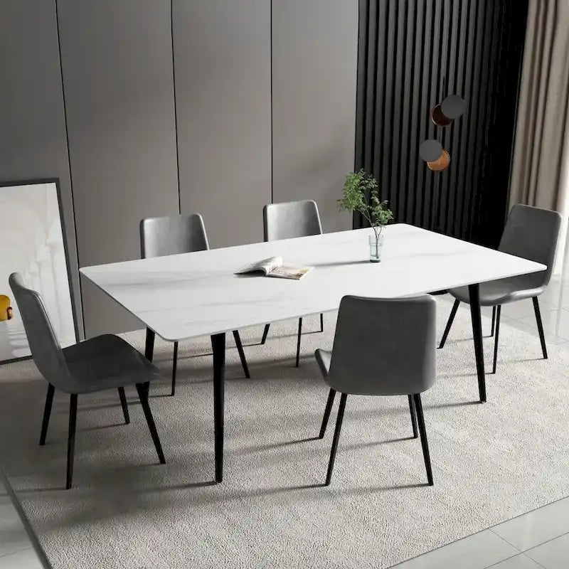 Mesa de comedor rectangular moderna con superficie de piedra y patas de acero negro