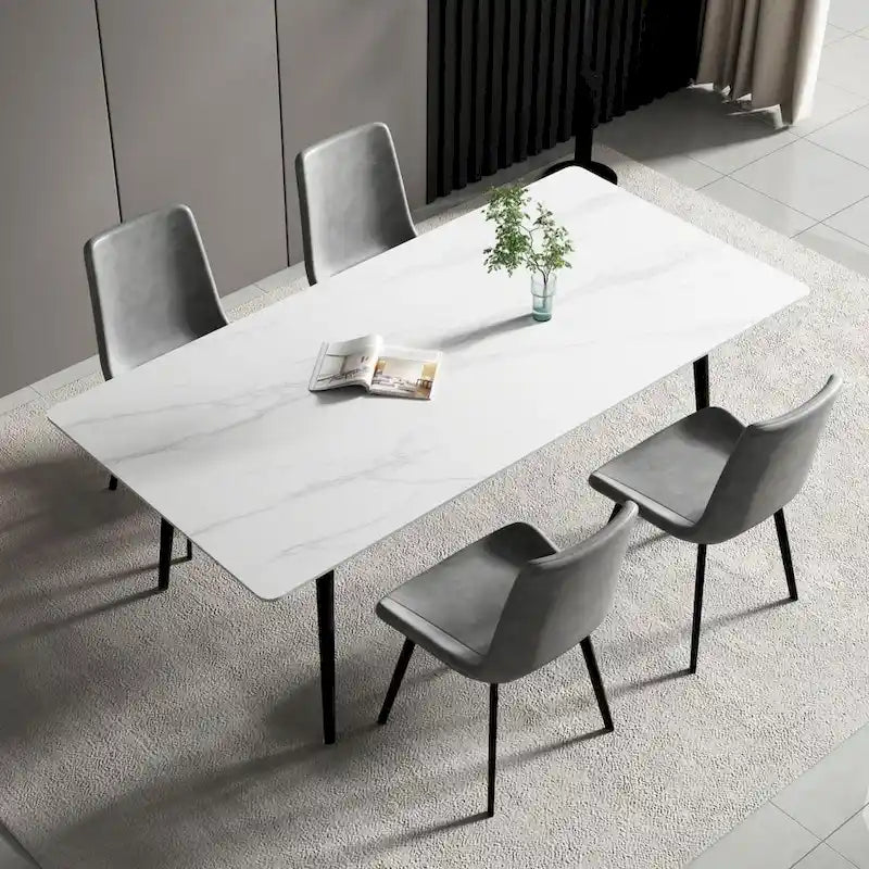 Mesa de comedor rectangular moderna con superficie de piedra y patas de acero negro
