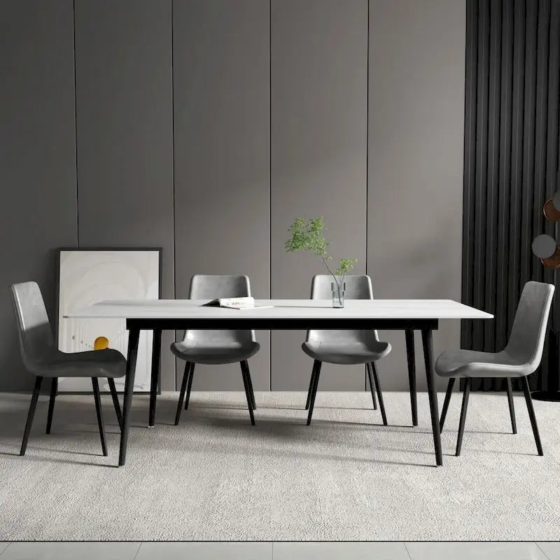 Mesa de comedor rectangular moderna con superficie de piedra y patas de acero negro