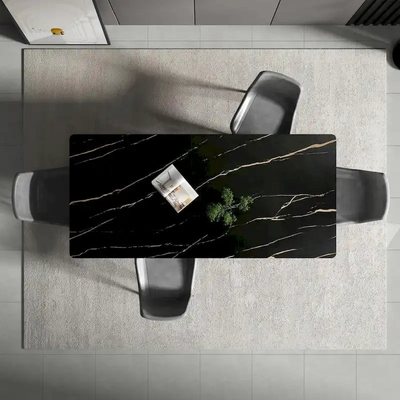 Mesa de comedor rectangular moderna con superficie de piedra y patas de acero negro