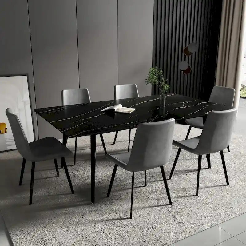 Mesa de comedor rectangular moderna con superficie de piedra y patas de acero negro