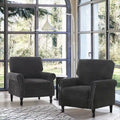 Sillón decorativo tapizado de chenilla con brazos enrollados y ribete de tachuelas
